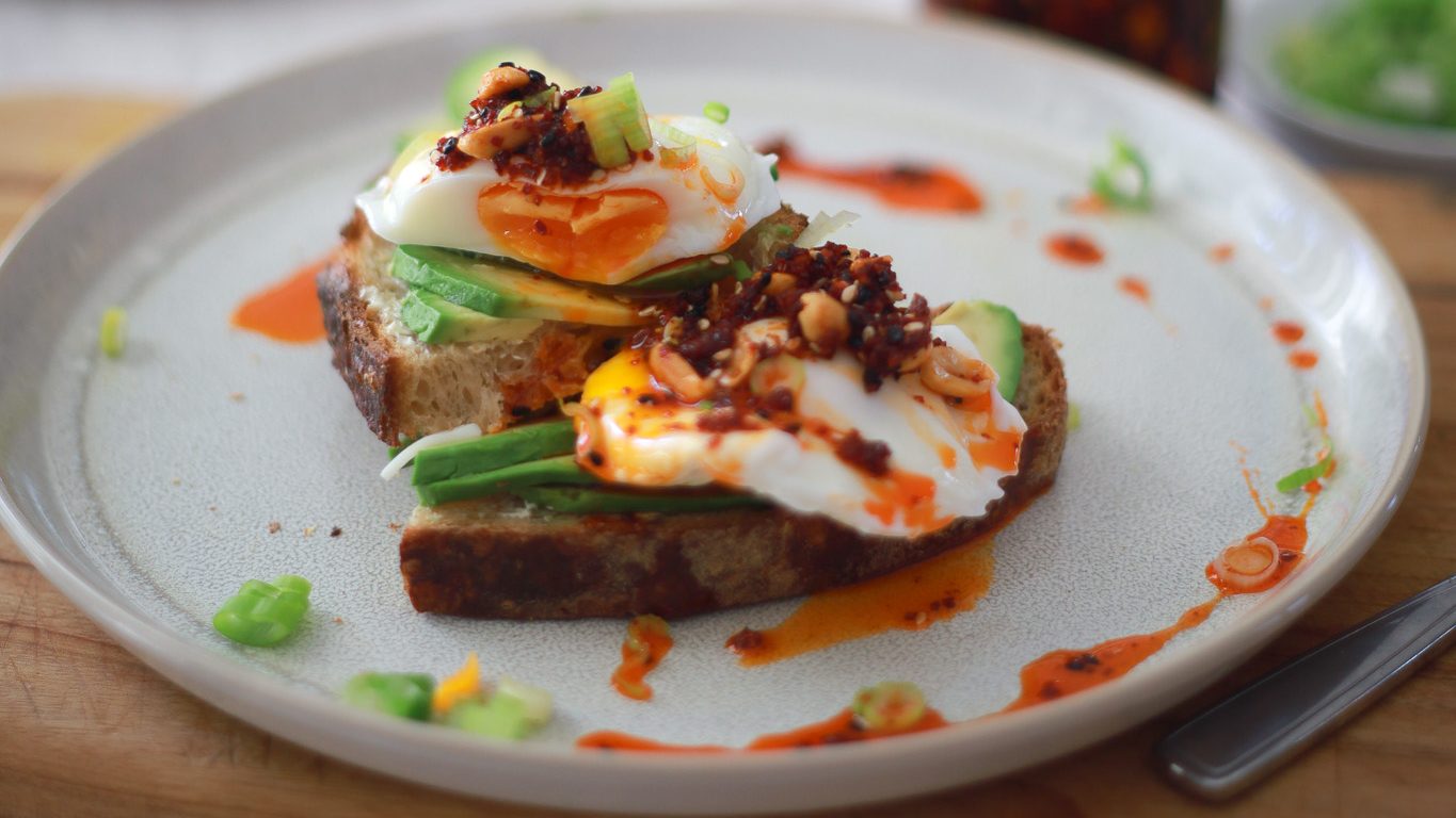 Poached eggs on avocado toast with peanut rays the tasty spoonful